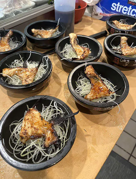 Grilled fish fin bowls with teriyaki sauce and shredded daikon at Kinzakaya Japanese Resturant, a Japanese restaurant in West Covina