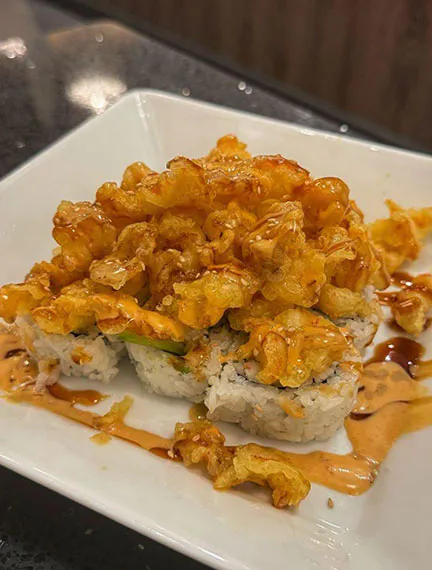 Fried tempura sushi roll with honey glaze and spicy mayo at Kinzakaya Japanese Resturant, a Japanese restaurant in West Covina